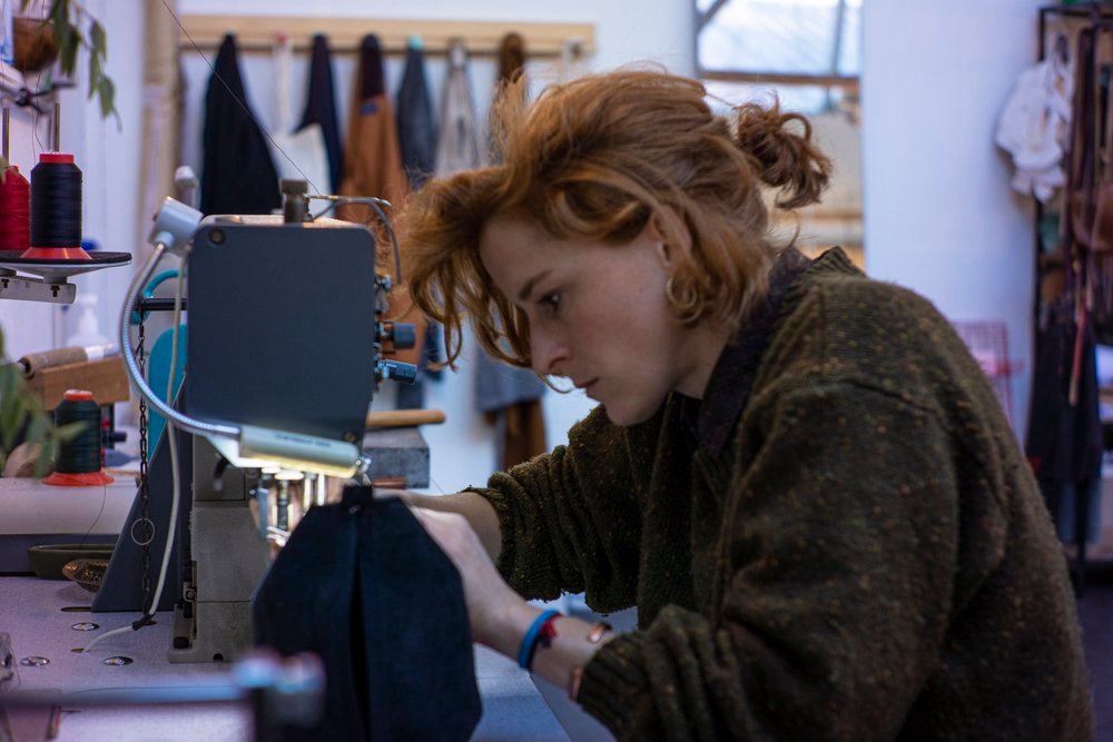 Liesbeth Verhelst at work behind the sewing machine in the ZLQ atelier